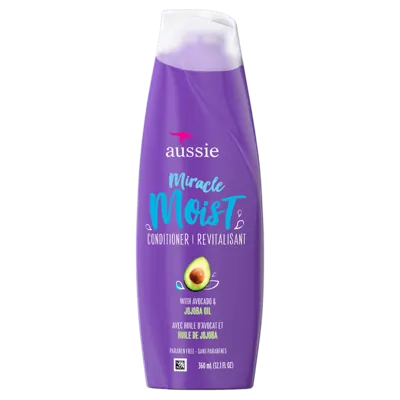 A tied FEMMENORDIC's choice in the Aussie vs Tresemme conditioner comparison, Aussie's Miracle Moist Conditioner.