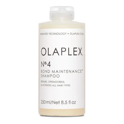 A tied FEMMENORDIC's choice in the Olaplex vs OUAI shampoo comparison, the Olaplex No.4 Bond Maintenance Shampoo.