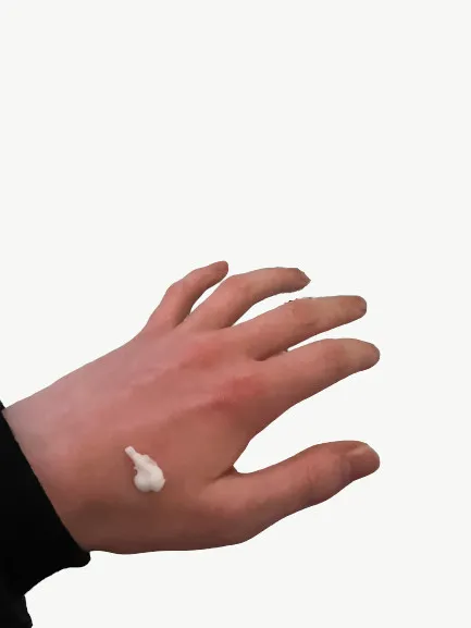 cerave pm facial moisturizing lotion texture applied to back of hand