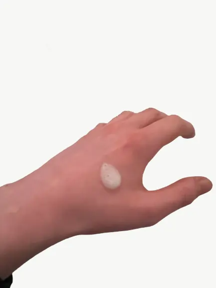 cetaphil gentle cleanser texture applied to back of hand